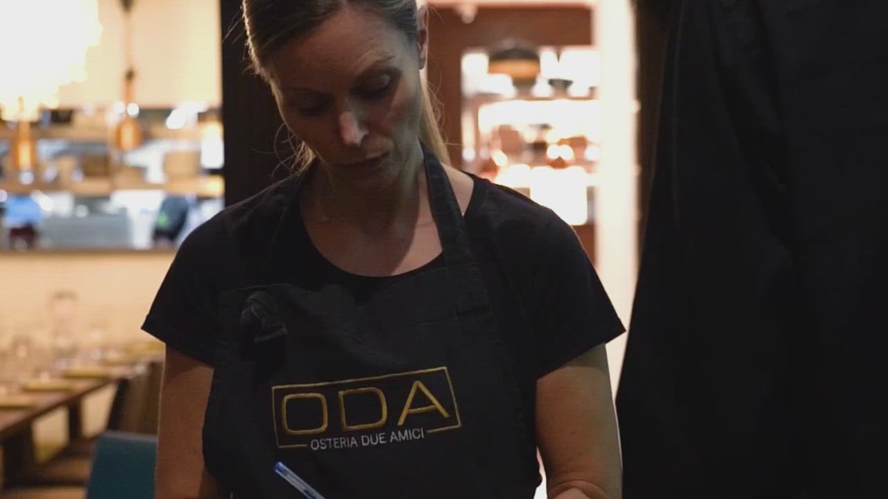 Merchant taking a payment in a hospitality environment