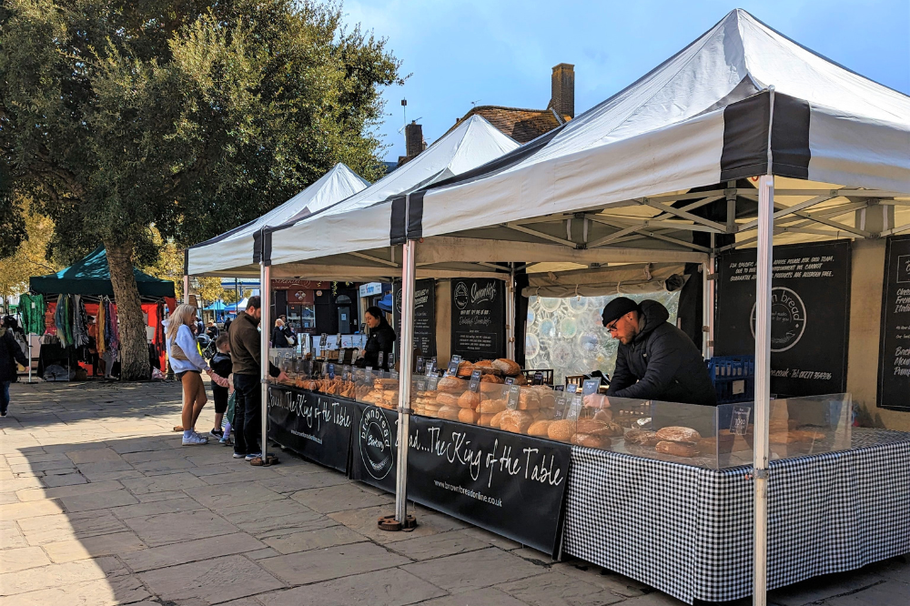 Market stall seller accepting a contactless card payment